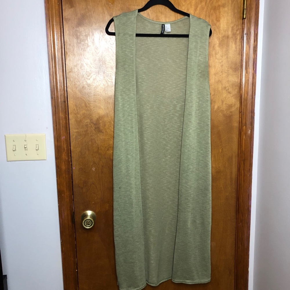 Green longline sweater vest. Gently worn.